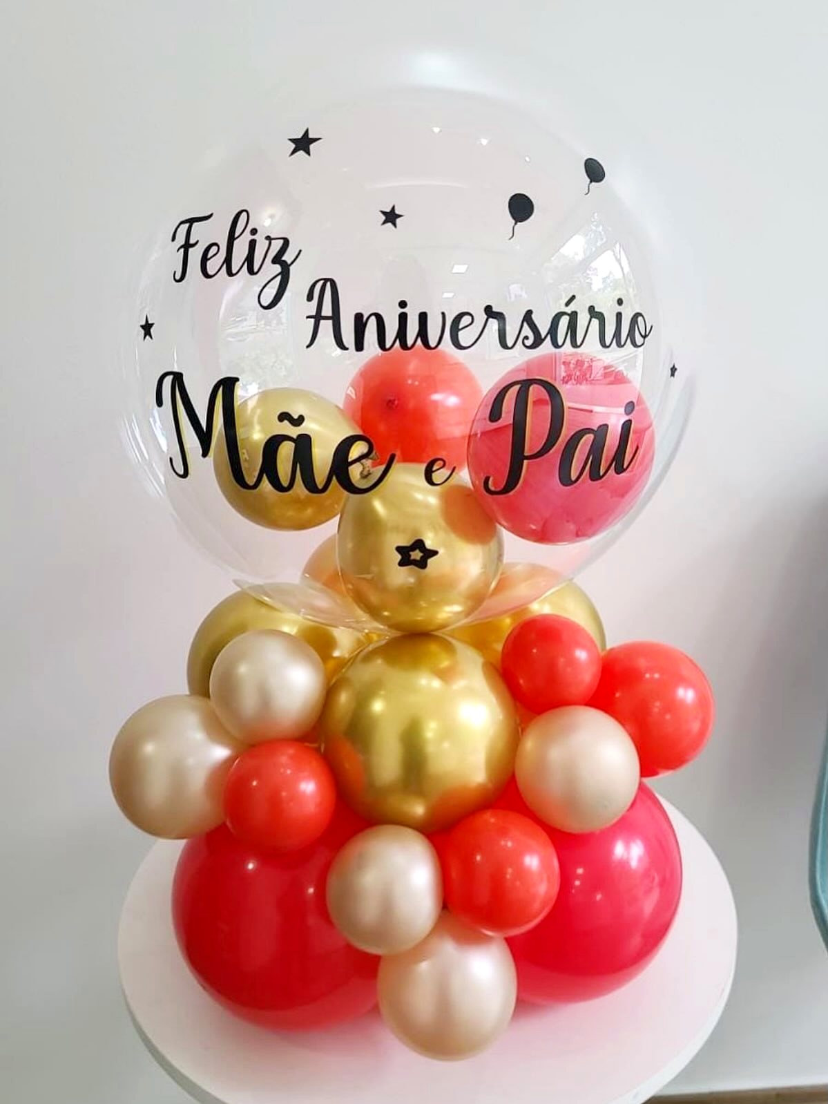 Balão bubble com nome gravado em dourado feito pela Balões Fest em Belo Horizonte